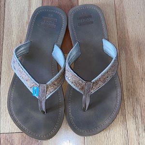 Worn Toms flip flops
